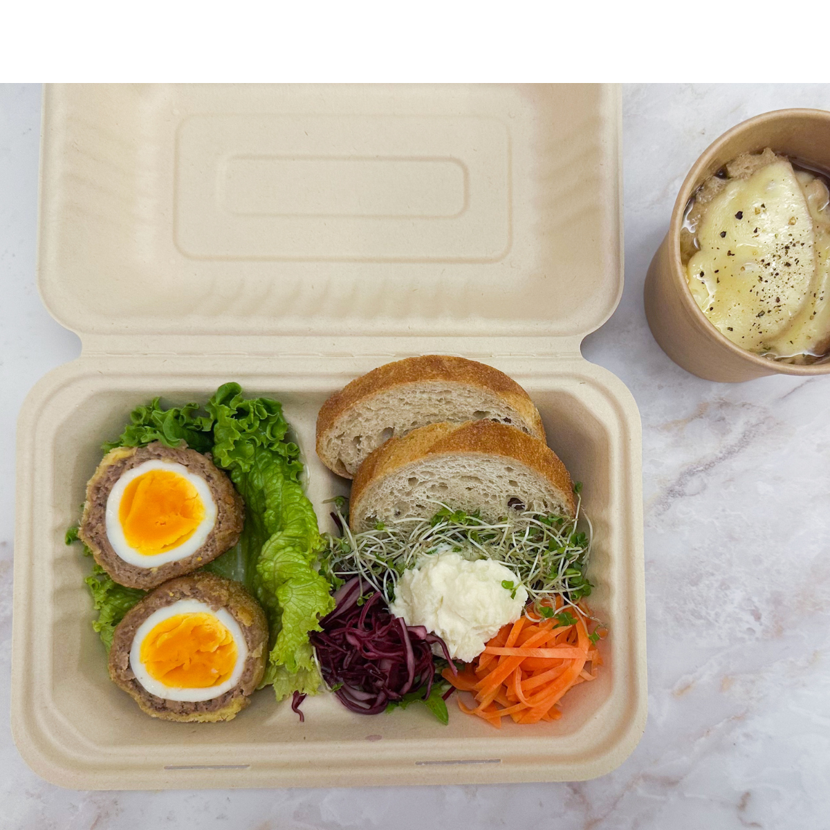 <過去販売商品>週替わり弁当 スコッチエッグとオニオングラタンスープのセット